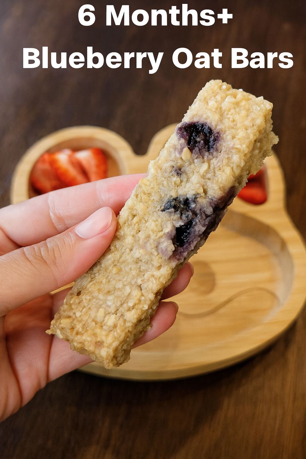 Blueberry Oat Bars plated on a Moon and Moo baby plate
