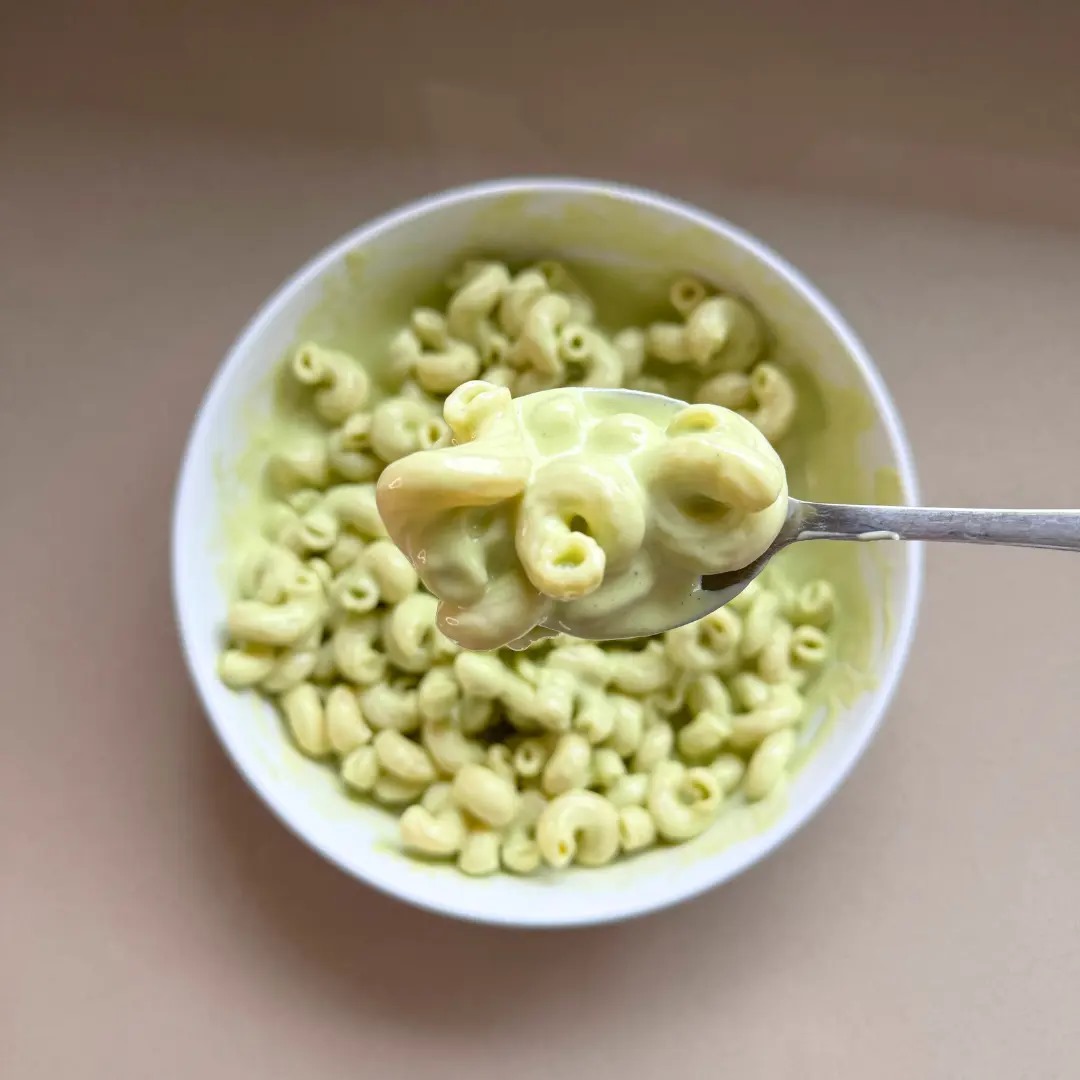 Creamy broccoli sauce poured over pasta